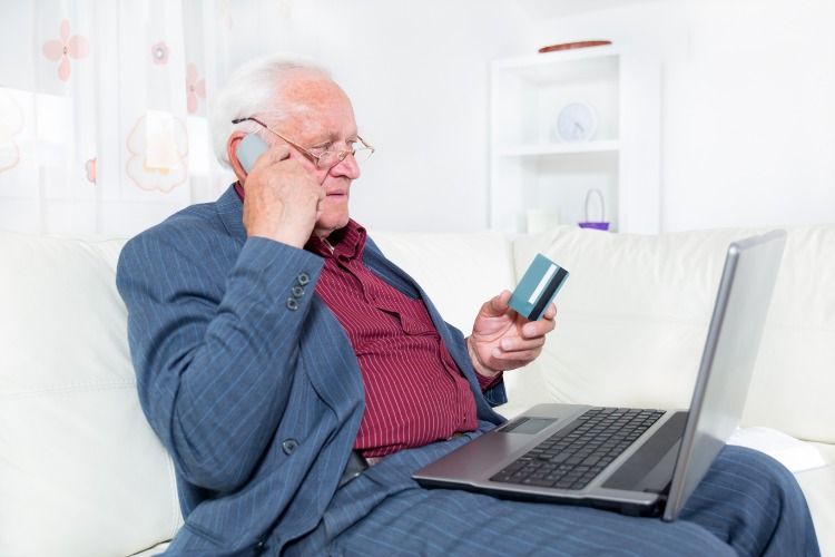 elderly gentleman with laptop